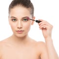 Eye make up apply. Mascara applying closeup, long lashes. makeup brush. Isolated. Royalty Free Stock Photo