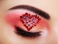 Eye make-up girl with a heart