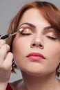 Eye makeup tutorial. Beauty model style Royalty Free Stock Photo