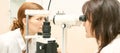 Eye ophthalmologist exam. Eyesight recovery. Astigmatism check concept. Ophthalmology diagmostic device. Beauty girl portrait in