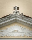 The Eye of Providence over the entrance of church St. Johannes in Laas