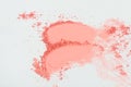 Pink eye shadow or pink bronzer smudge on white background Royalty Free Stock Photo
