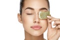 Eye Skin Care. Beautiful Woman With Green Tea Bag Under Eyes Royalty Free Stock Photo