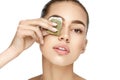 Eye Skin Care. Beautiful Woman With Green Tea Bag Under Eyes Royalty Free Stock Photo