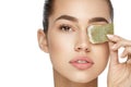 Eye Skin Care. Beautiful Woman With Green Tea Bag Under Eyes Royalty Free Stock Photo