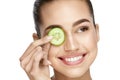 Eye Skin Care. Woman With Natural Makeup Using Cucumber Royalty Free Stock Photo