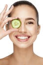 Eye Skin Care. Woman With Natural Makeup Using Cucumber Royalty Free Stock Photo