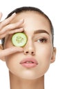 Eye Skin Care. Woman With Natural Makeup Using Cucumber Royalty Free Stock Photo