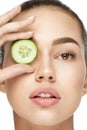 Eye Skin Care. Woman With Natural Makeup Using Cucumber Royalty Free Stock Photo