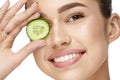 Eye Skin Care. Woman With Natural Makeup Using Cucumber Royalty Free Stock Photo