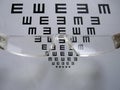 Eye test chart and glasses Royalty Free Stock Photo
