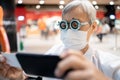 Eye test examination,senior woman wearing eye glasses used in eye vision clinics,old elderly in optometry glasses or trial frame, Royalty Free Stock Photo