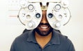 Eye test, face or happy man consulting to help eyesight at optometrist for a optical assessment. Optometry, wellness or Royalty Free Stock Photo