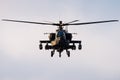 Looking at the front of a hovering Apache Longbow helicopter Royalty Free Stock Photo