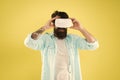 Eye tracking. Testing software. Bearded man yellow background vr glasses. Digital future and innovation. Developing Royalty Free Stock Photo