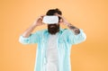 Eye tracking. Testing software. Bearded man yellow background vr glasses. Digital future and innovation. Developing Royalty Free Stock Photo