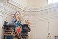 Eye in the triangle and figure of angels at iconostasis on church Royalty Free Stock Photo