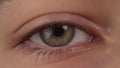 Eye of a young man close-up. With red capillaries on a white eyeball