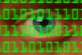 Eyeball watching digital binary code