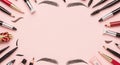 Eyebrow Makeup Products and Tools Arranged in a Circle on a Pink Background Royalty Free Stock Photo