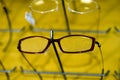 Eyeglasse frames on wall display