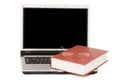 Eyeglasses and books on the laptop Royalty Free Stock Photo