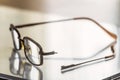 Eyeglasses with a broken handle Royalty Free Stock Photo