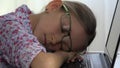 Eyeglasses Child Sleeping on Laptop, Kid on Notebook, Shortsighted Girl at Desk