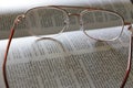 Eyeglasses on a dictionary Royalty Free Stock Photo
