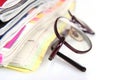 Eyeglasses and newspapers Royalty Free Stock Photo