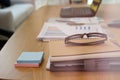 eyeglasses notebook document computer on desk at office workplace. business workspace Royalty Free Stock Photo