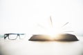 Eyeglasses and open book Royalty Free Stock Photo