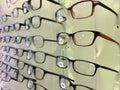 Eyeglasses in optician store background