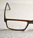 Eyeglasses on paper with lorem ipsum