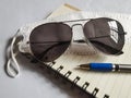 Eyeglasses with pen, notebook and medical mask KF94