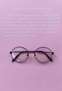 Eyeglasses with pink paper with message