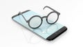 Eyeglasses set on smartphone