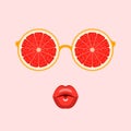 Eyeglasses with slices of ripe grapefruit and lips blowing air kiss