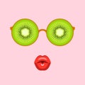 Eyeglasses with slices of ripe kiwifruit and lips blowing air kiss