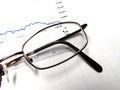 Eyeglasses and Stock Chart