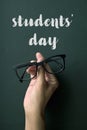 Eyeglasses and text students day Royalty Free Stock Photo