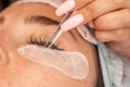 Eyelash extension procedure. Woman eye with long eyelashes. lashes, close up, macro, selective focus. Royalty Free Stock Photo