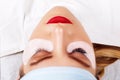 Eyelash Extension Procedure. Woman Eye with Long Eyelashes. Lashes, close up, selected focus. Royalty Free Stock Photo