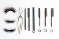 Eyelash and Hair Styling Tools on White Background Royalty Free Stock Photo