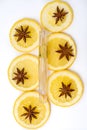 eyelash repair on slices of fresh yellow lemon and anise star on white background Royalty Free Stock Photo