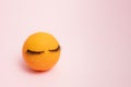 Eyelashes on oranges. Minimal design. Pink background. Funny summer scene Royalty Free Stock Photo