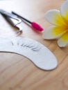 Eyelashes on the wooden table Royalty Free Stock Photo