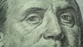 Eyes of Benjamin Franklin 100 dollars note close-up Royalty Free Stock Photo