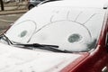 eyes drawn on the windshield of the car Royalty Free Stock Photo