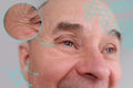 Eyes, forehead of elderly man, part of the face close-up, fine wrinkles on the face, spots, cosmetology, plastic surgery and Royalty Free Stock Photo